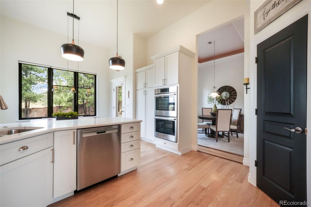 Dining room, Interior, Kitchen, Pendant Lights, Recessed Lighting, Stainless Steel Appliances, Wood Texture Flooring