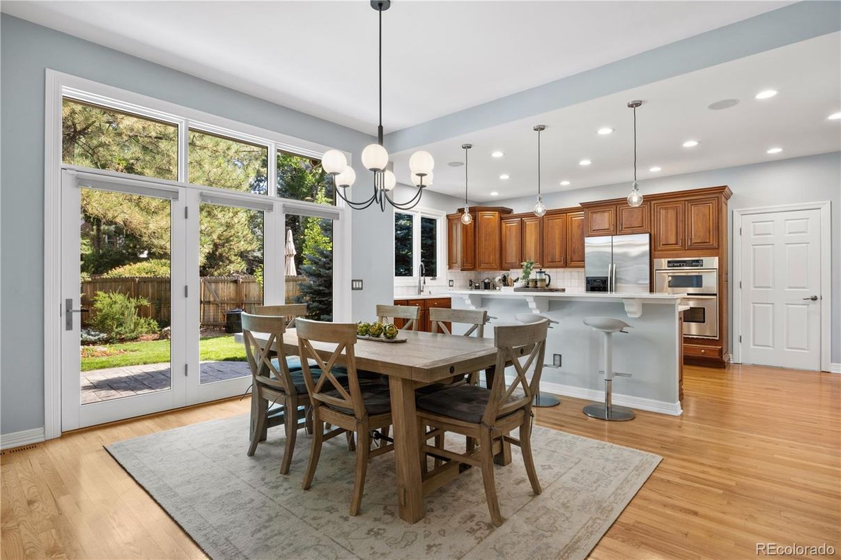Chandelier, Dining room, Interior, Kitchen, Pendant Lights, Recessed Lighting, Stainless Steel Appliances, Wood Texture Flooring