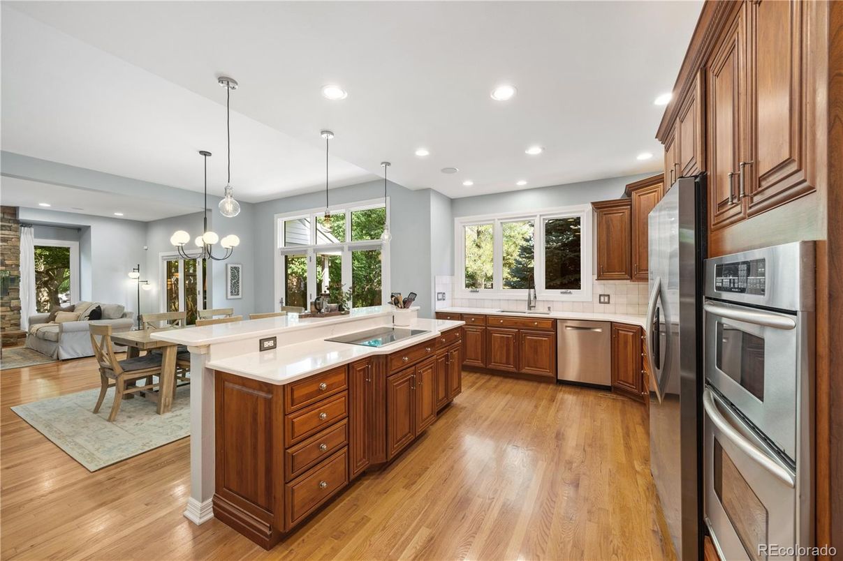 Dining room, Interior, Kitchen, Living room, Pendant Lights, Recessed Lighting, Stainless Steel Appliances, Wood Texture Flooring