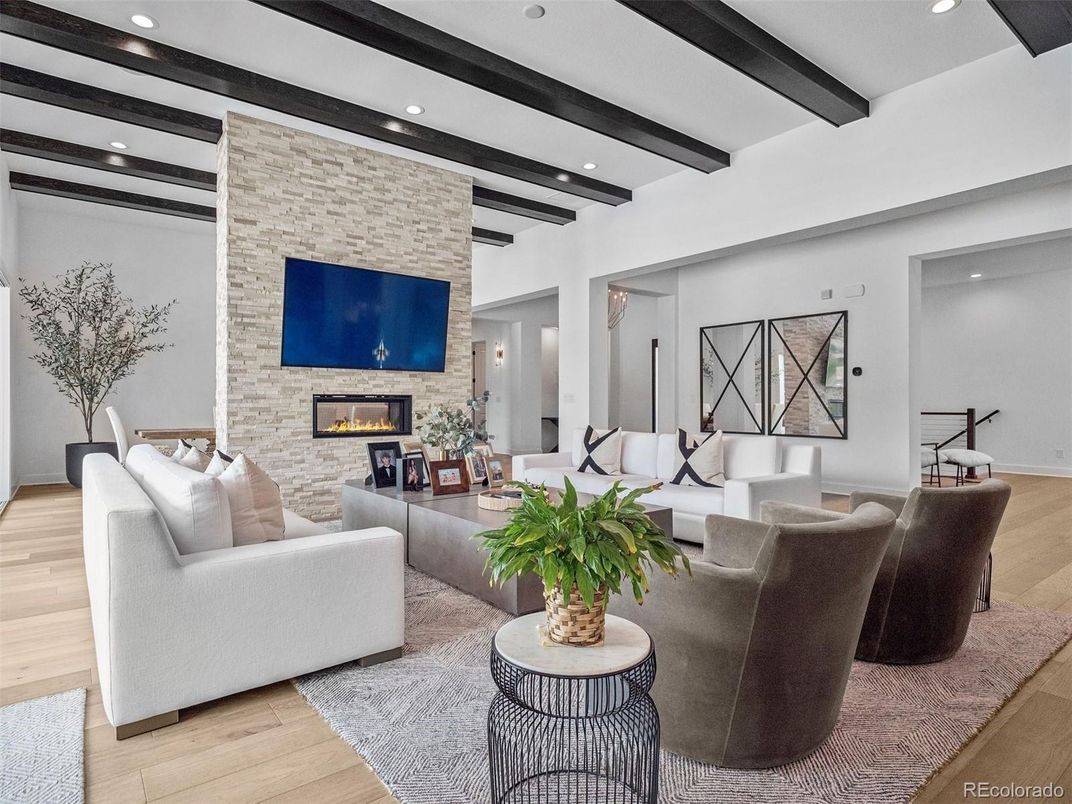 Fireplace, Interior, Living room, Recessed Lighting, Stone Walls, Wooden Beams, Wood Texture Flooring