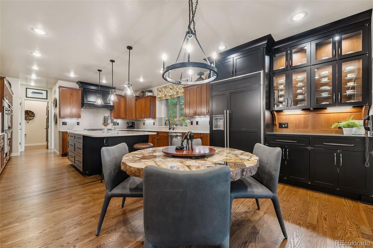 Dining room, Interior, Kitchen, Pendant Lights, Recessed Lighting, Stainless Steel Appliances, Wood Texture Flooring