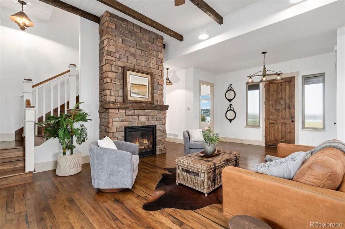 Fireplace, Interior, Living room, Pendant Lights, Recessed Lighting, Stone Walls, Wooden Beams, Wood Texture Flooring