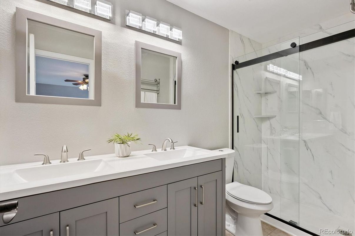 Bathroom, Dual Sink Vanities, Glass Shower, Interior, Marble Walls