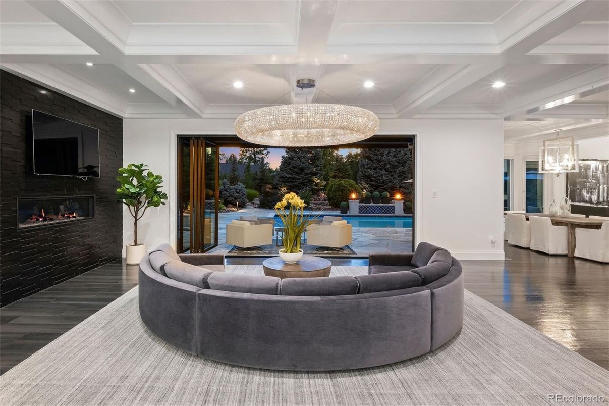 Chandelier, Fireplace, Interior, Living room, Pendant Lights, Recessed Lighting, Wood Texture Flooring