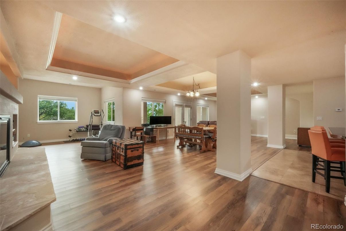 Chandelier, Dining room, Fireplace, Interior, Living room, Recessed Lighting, Wood Texture Flooring