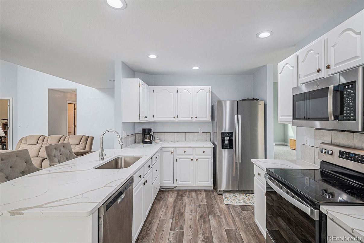 Interior, Kitchen, Recessed Lighting, Stainless Steel Appliances, Wood Texture Flooring