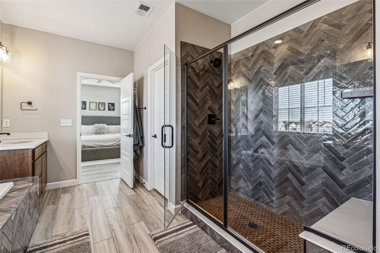 Bathroom, Bedroom, Glass Shower, Interior, Recessed Lighting, Wood Texture Flooring