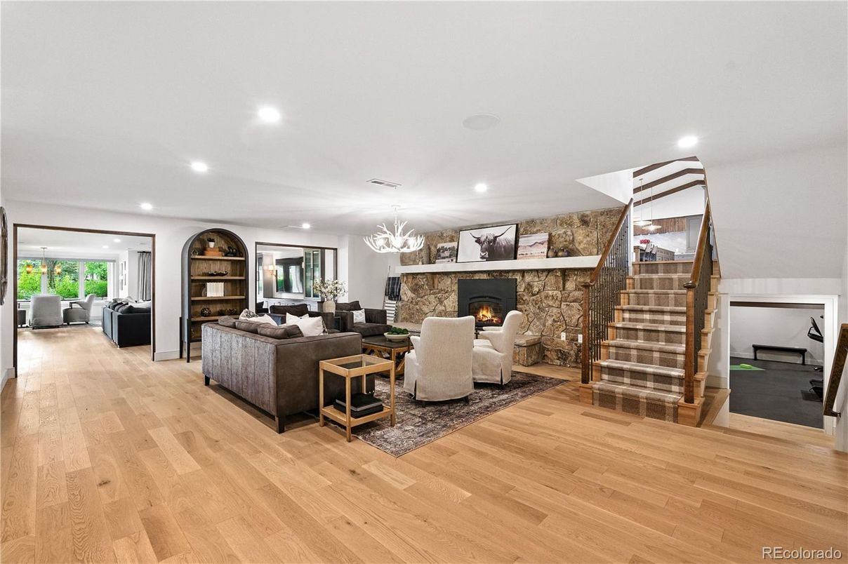 Chandelier, Fireplace, Interior, Living room, Recessed Lighting, Wood Texture Flooring