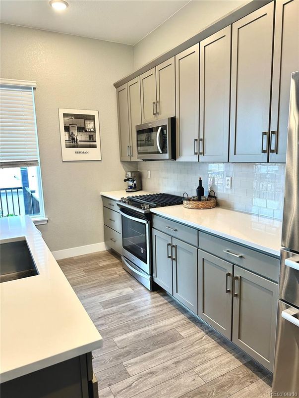 Interior, Kitchen, Recessed Lighting, Stainless Steel Appliances, Wood Texture Flooring