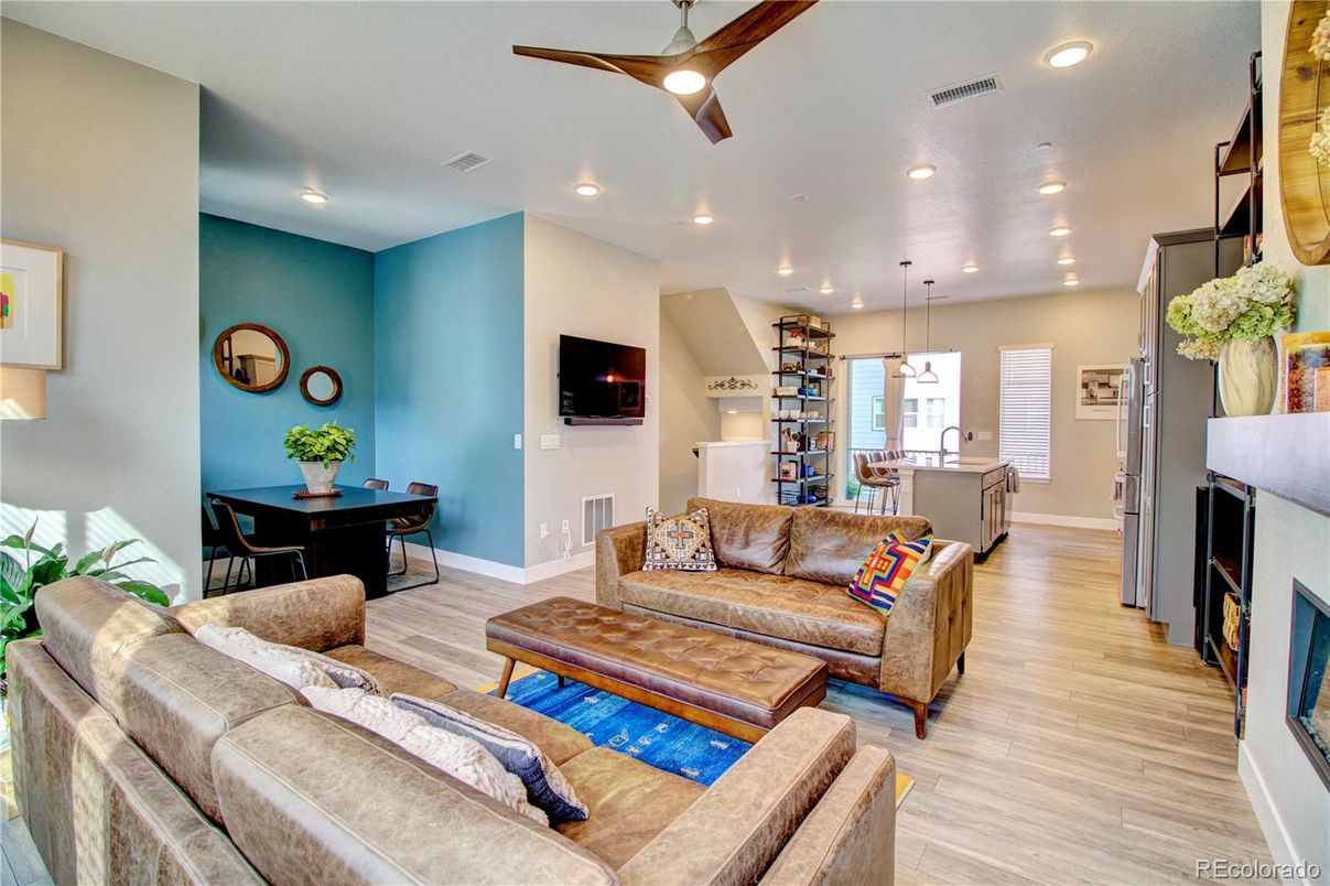 Dining room, Fireplace, Interior, Living room, Pendant Lights, Recessed Lighting, Wood Texture Flooring