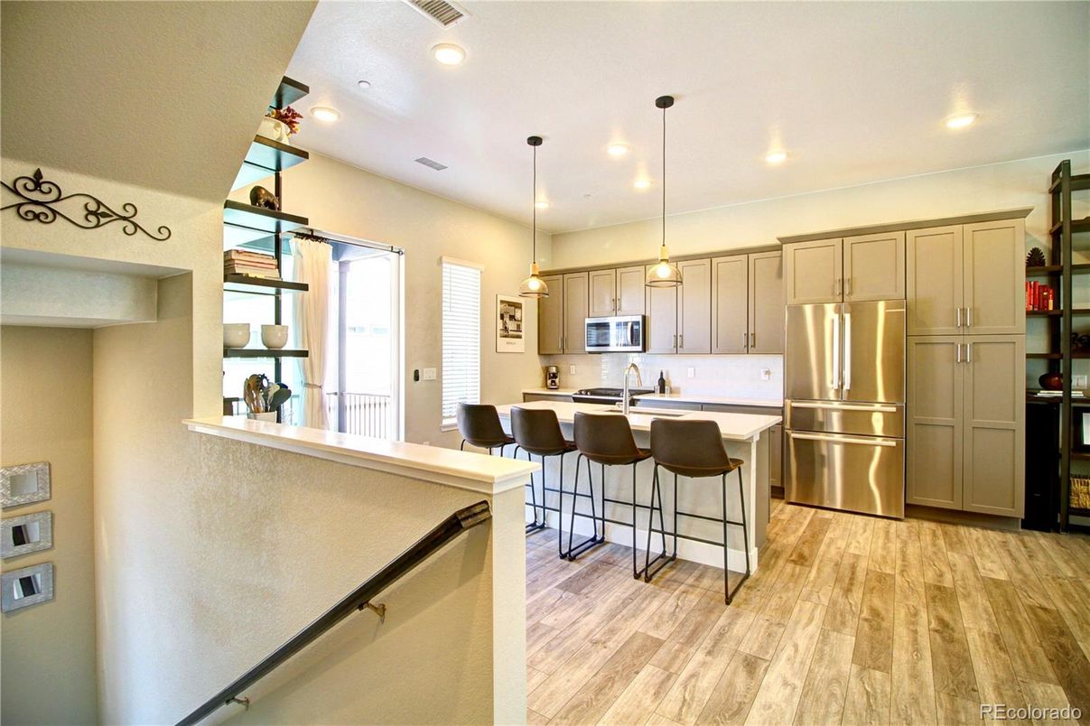 Interior, Kitchen, Pendant Lights, Recessed Lighting, Stainless Steel Appliances, Wood Texture Flooring