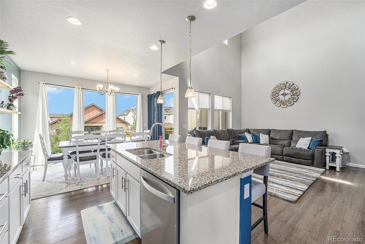 Chandelier, Dining room, Interior, Kitchen, Living room, Pendant Lights, Recessed Lighting, Wood Texture Flooring