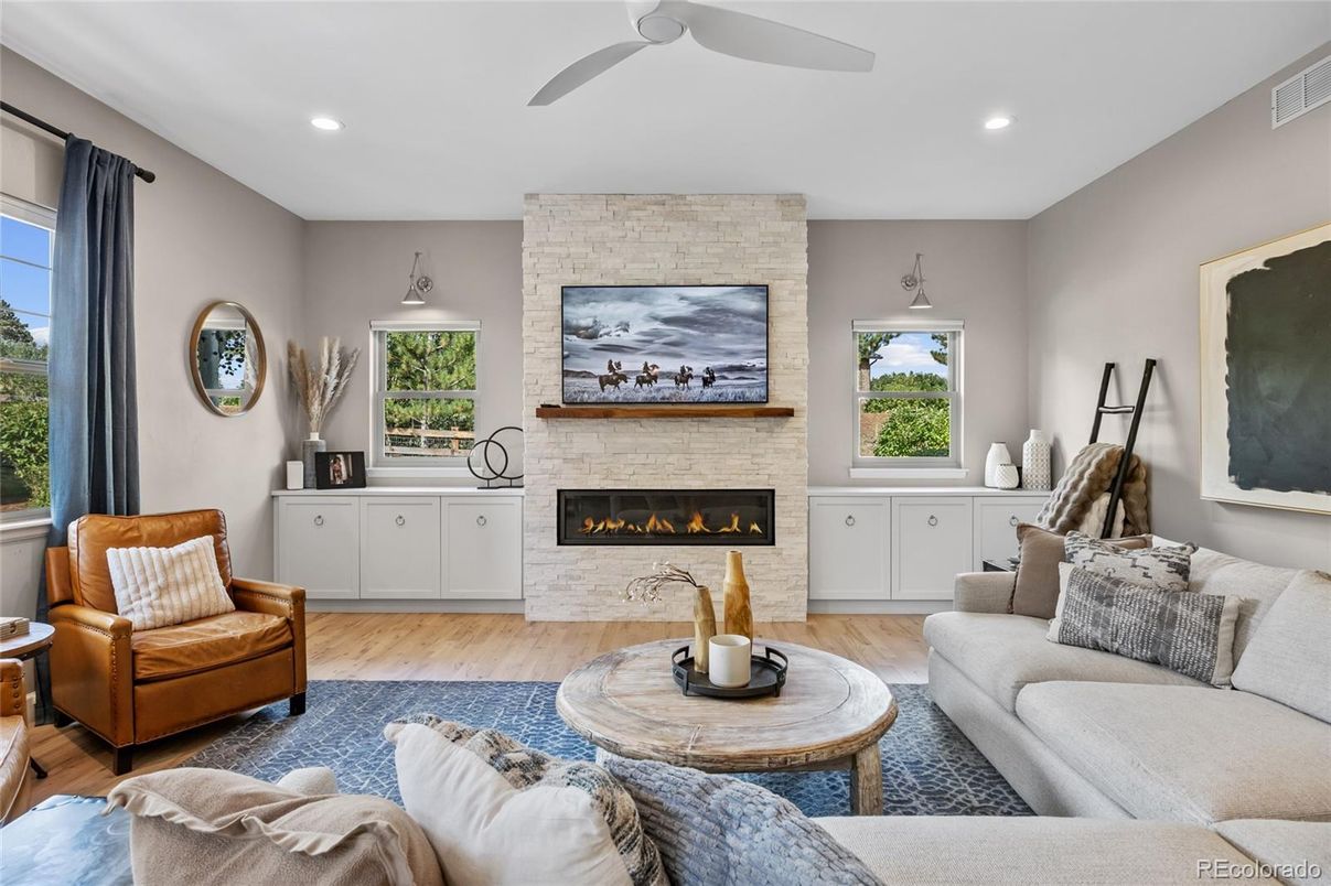 Fireplace, Interior, Living room, Recessed Lighting, Stone Walls, Wood Texture Flooring