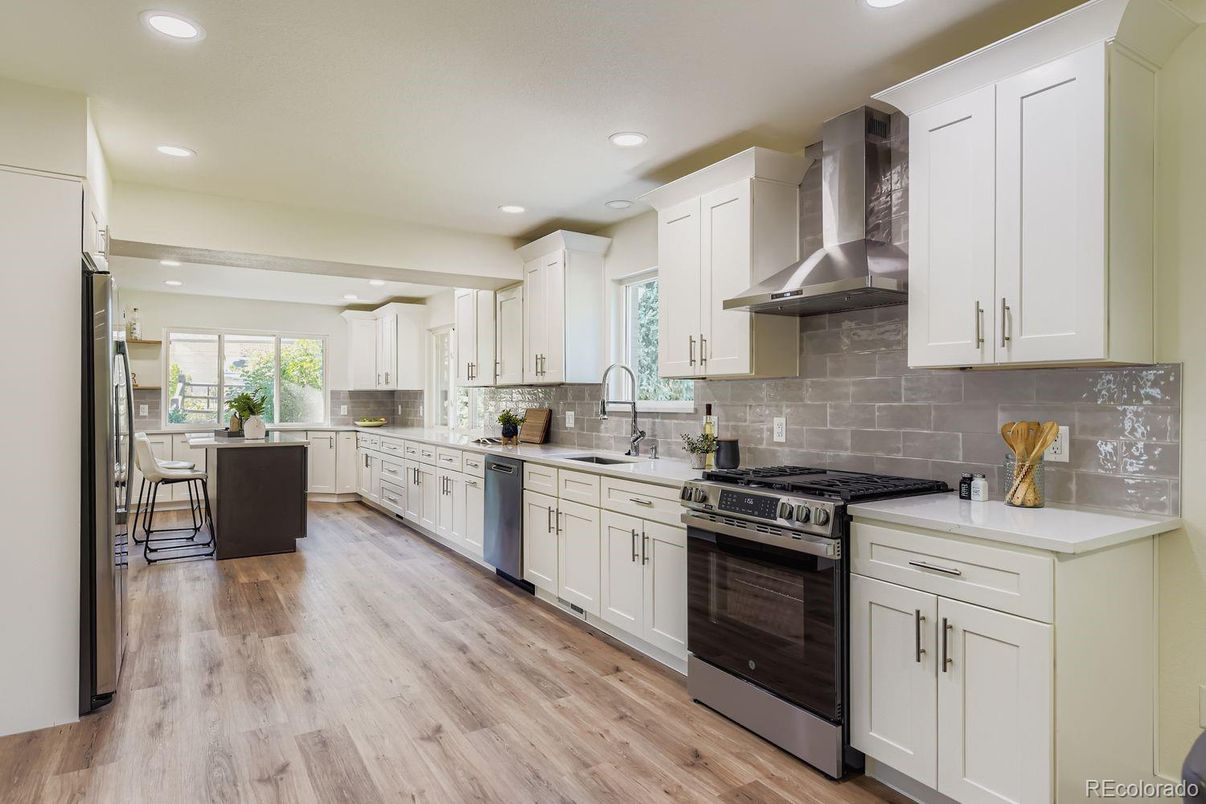 Dining room, Interior, Kitchen, Recessed Lighting, Stainless Steel Appliances, Wood Texture Flooring