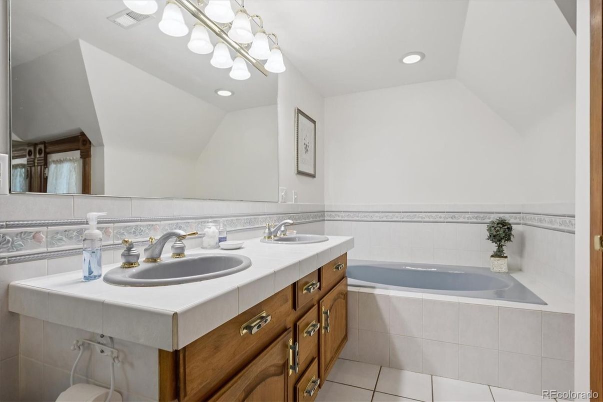 Bathroom, Dual Sink Vanities, Interior, Recessed Lighting, Tile Countertops