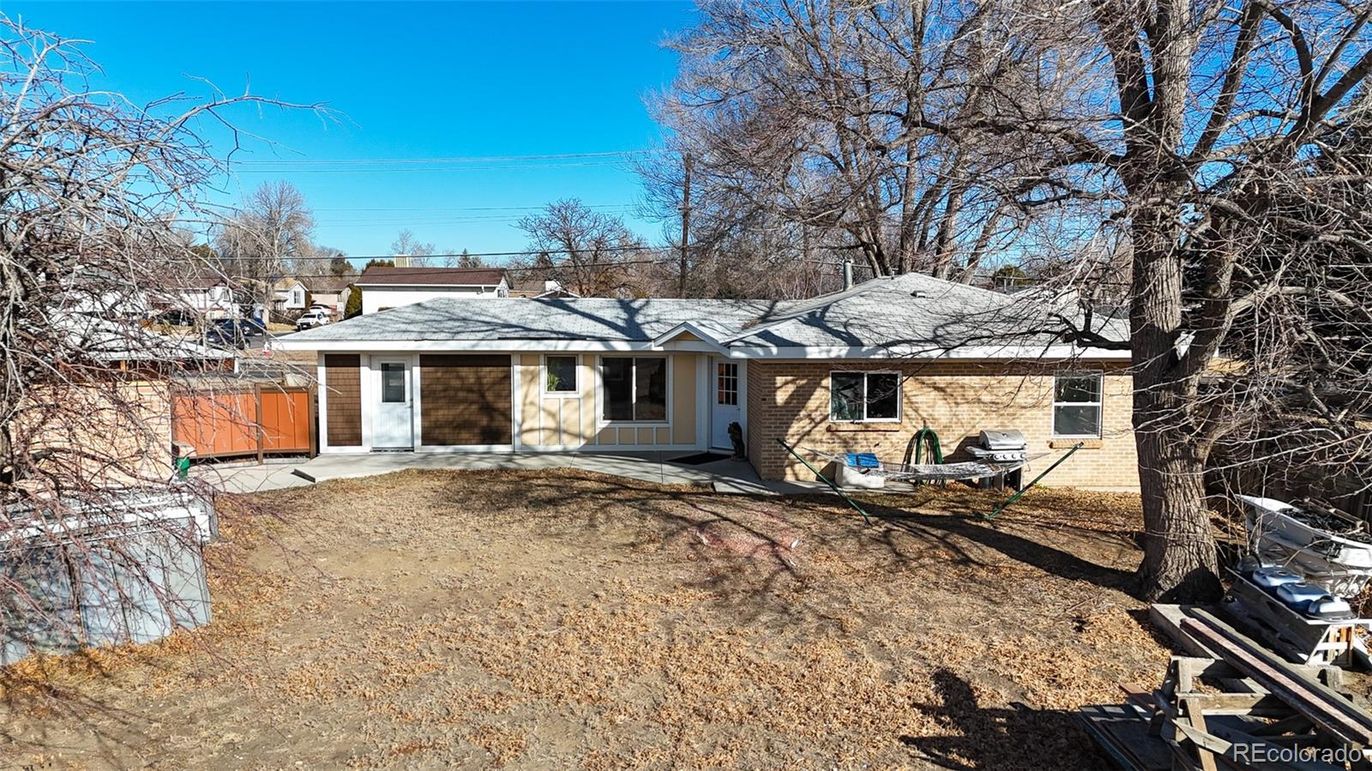 Attached, Backyard, Exterior, Facade, Brick Facade, Cape Cod