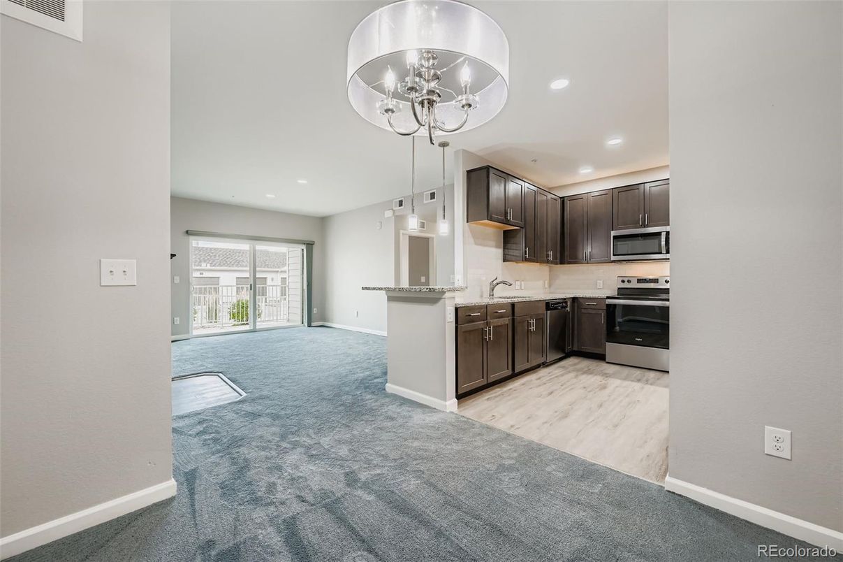 Chandelier, Interior, Kitchen, Pendant Lights, Recessed Lighting, Stainless Steel Appliances, Wood Texture Flooring