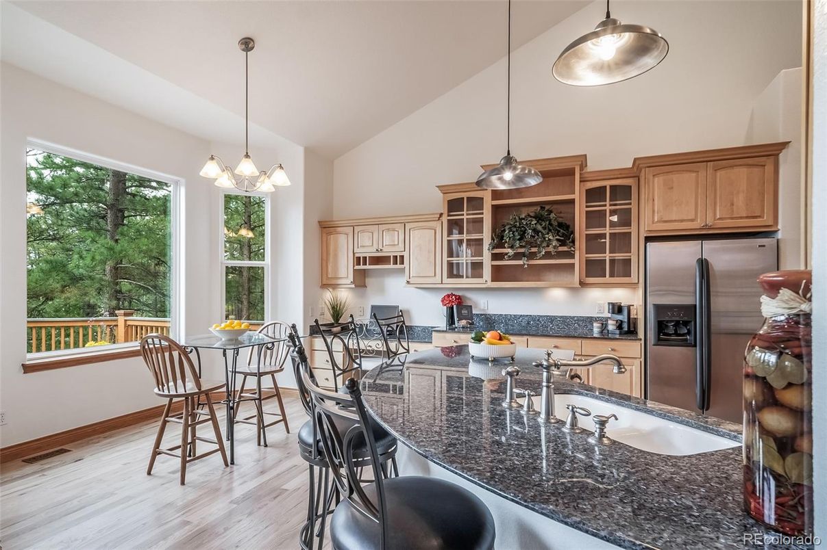Dining room, Interior, Kitchen, Pendant Lights, Stainless Steel Appliances, Wood Texture Flooring