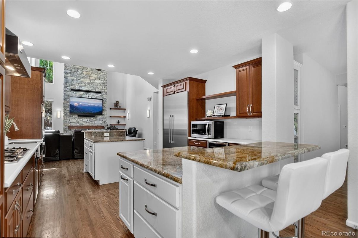 Interior, Kitchen, Recessed Lighting, Stainless Steel Appliances, Stone Walls, Wood Texture Flooring