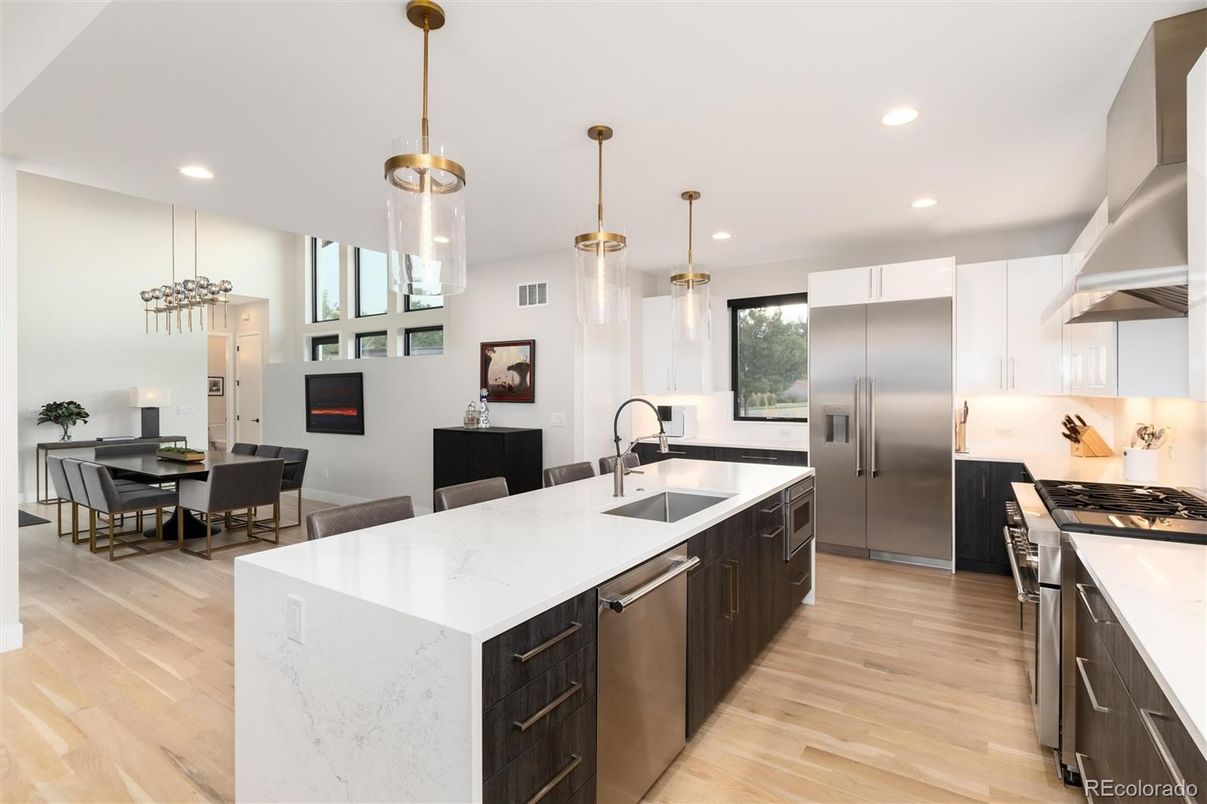 Dining room, Interior, Kitchen, Pendant Lights, Recessed Lighting, Stainless Steel Appliances, Wood Texture Flooring