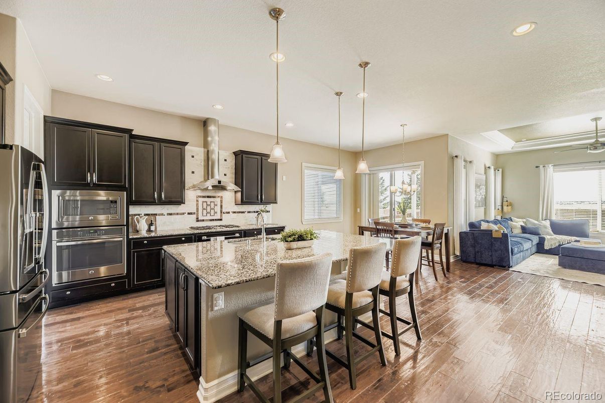 Dining room, Interior, Kitchen, Living room, Pendant Lights, Recessed Lighting, Stainless Steel Appliances, Wood Texture Flooring