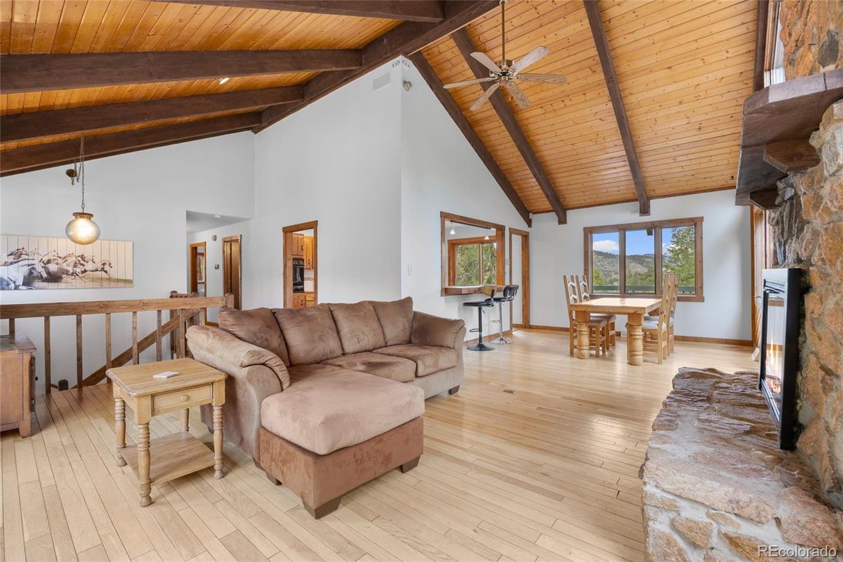 Dining room, Fireplace, Interior, Living room, Pendant Lights, Wooden Beams, Wooden Ceilings, Wood Texture Flooring