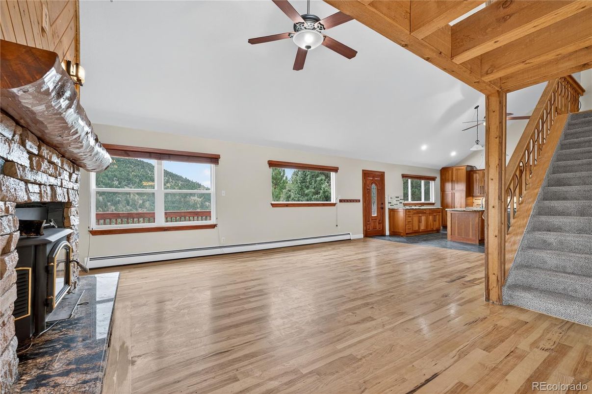 Empty room, Fireplace, Interior, Recessed Lighting, Wooden Beams, Wooden Ceilings, Wood Texture Flooring