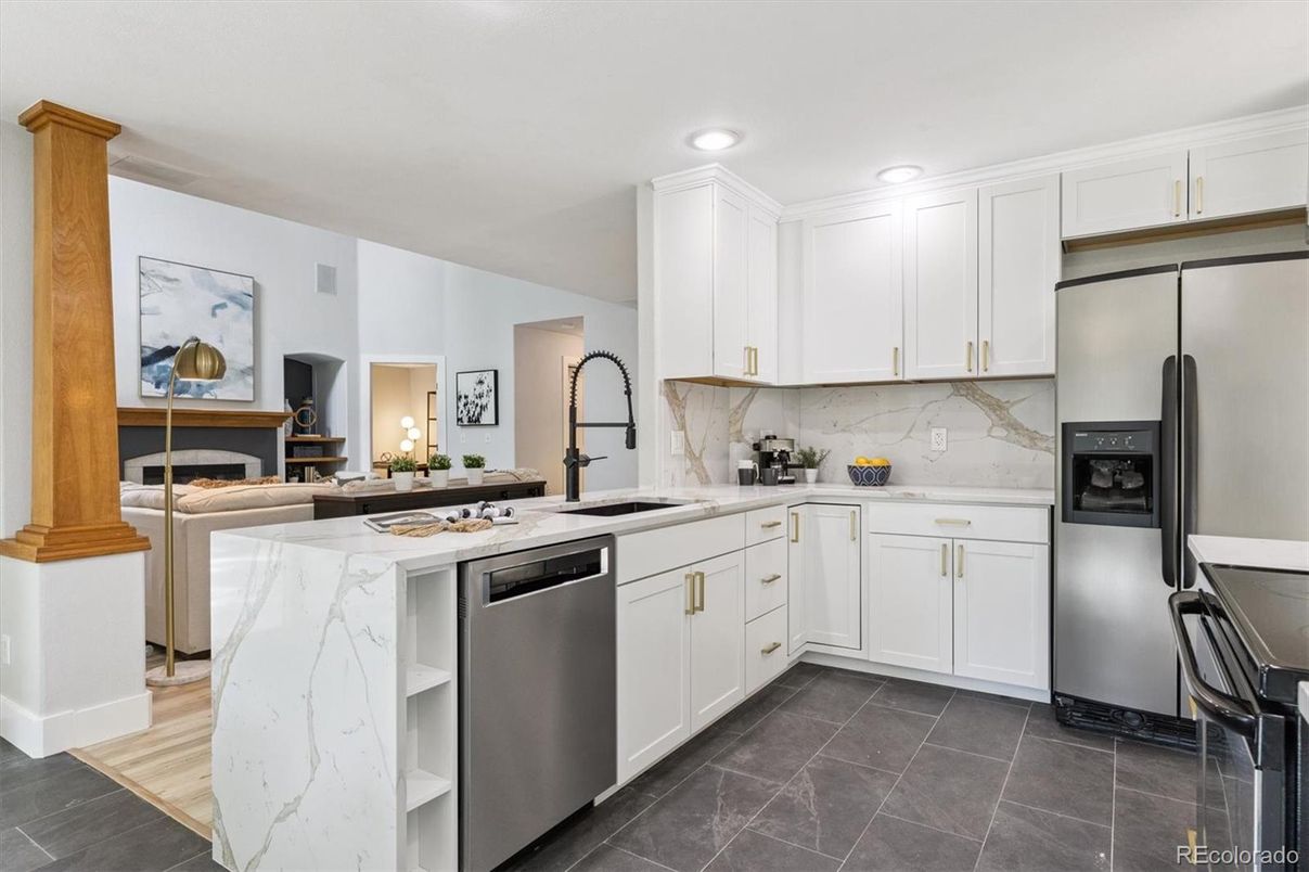 Interior, Kitchen, Marble Walls, Recessed Lighting, Stainless Steel Appliances