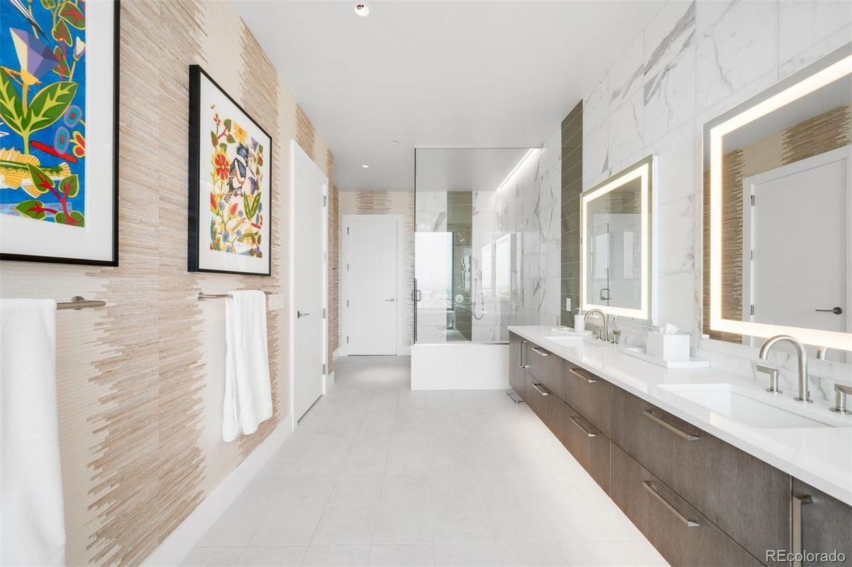 Bathroom, Dual Sink Vanities, Free Standing Baths, Glass Shower, Interior, Marble Walls, Recessed Lighting