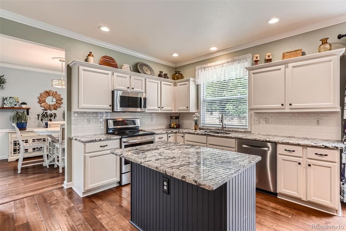 Dining room, Interior, Kitchen, Recessed Lighting, Stainless Steel Appliances, Wood Texture Flooring