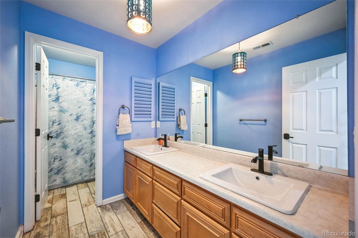 Bathroom, Dual Sink Vanities, Glass Shower, Interior, Pendant Lights, Wood Texture Flooring