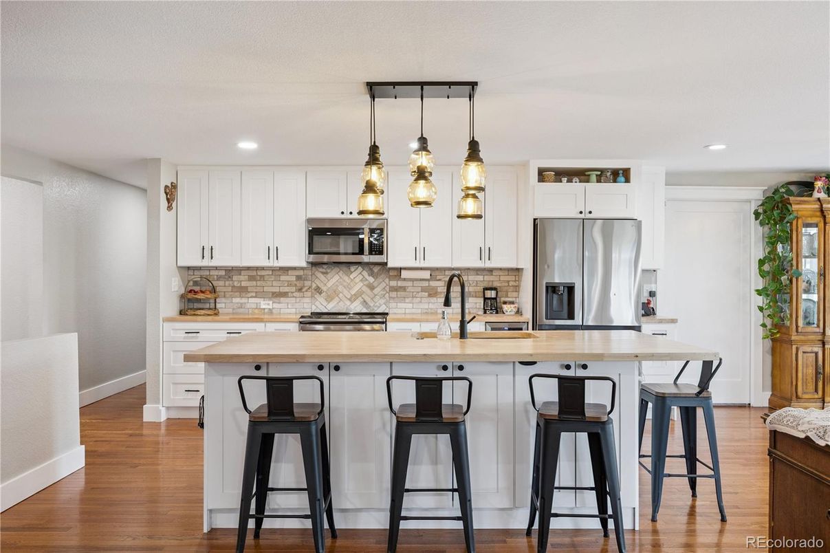 Interior, Kitchen, Pendant Lights, Recessed Lighting, Stainless Steel Appliances, Wood Texture Flooring