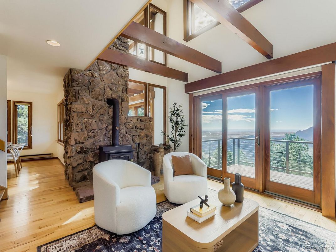 Fireplace, Interior, Living room, Recessed Lighting, Stone Walls, Water, Wooden Beams, Wood Texture Flooring