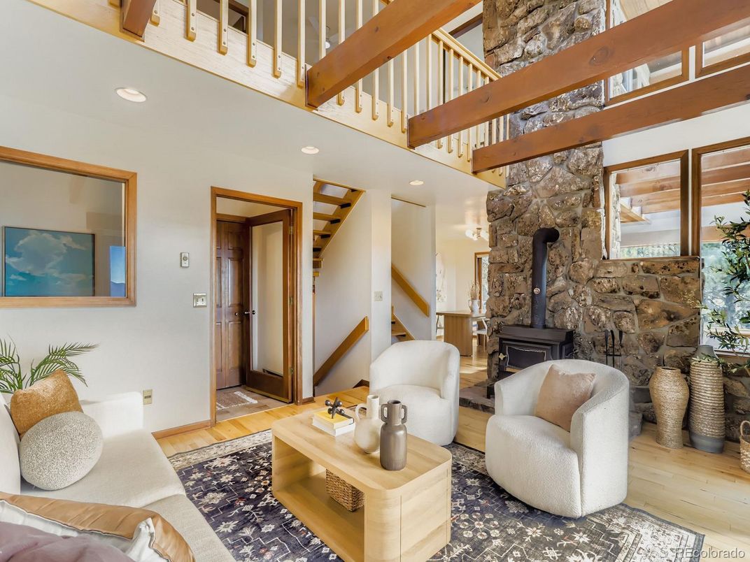 Fireplace, Interior, Living room, Recessed Lighting, Stone Walls, Wooden Beams, Wood Texture Flooring