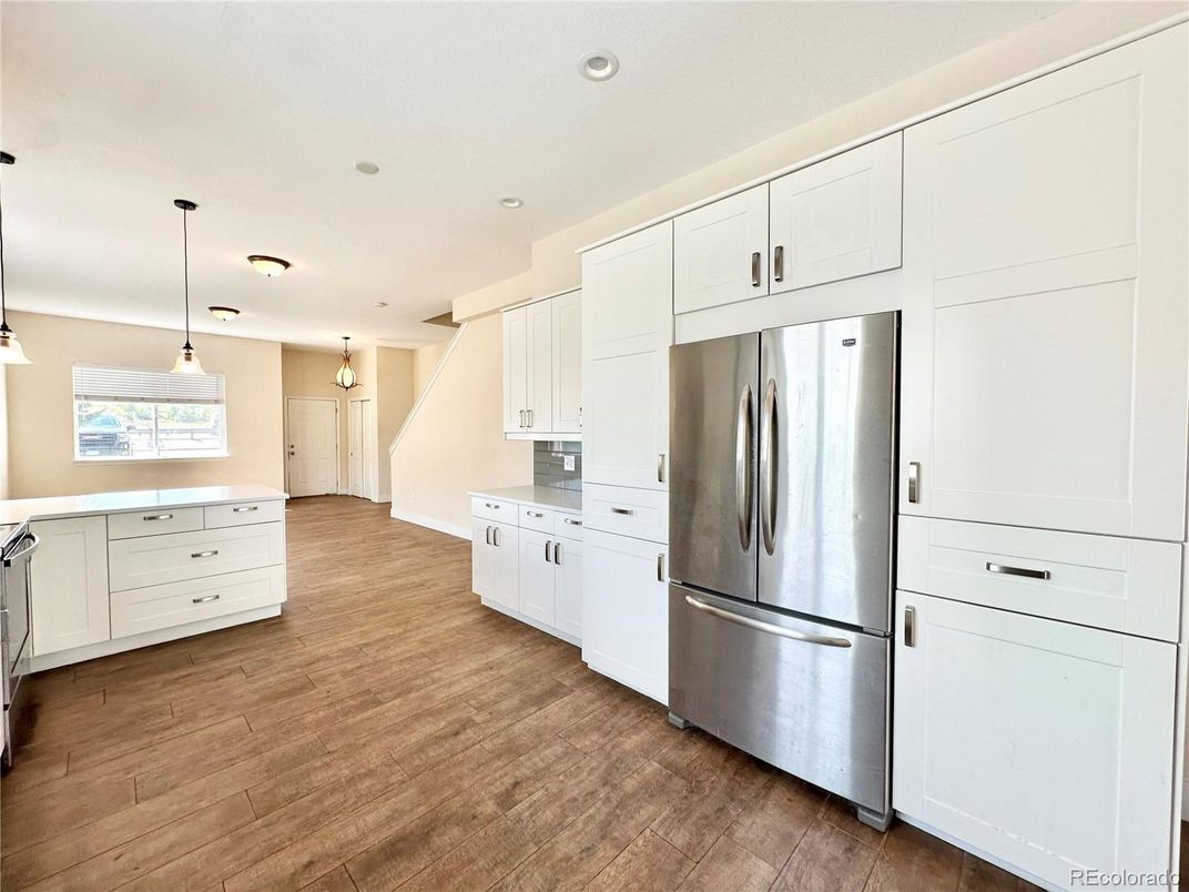 Interior, Kitchen, Pendant Lights, Recessed Lighting, Stainless Steel Appliances, Wood Texture Flooring