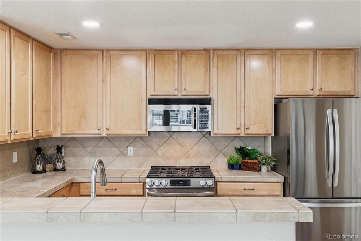 Interior, Kitchen, Recessed Lighting, Tile Countertops