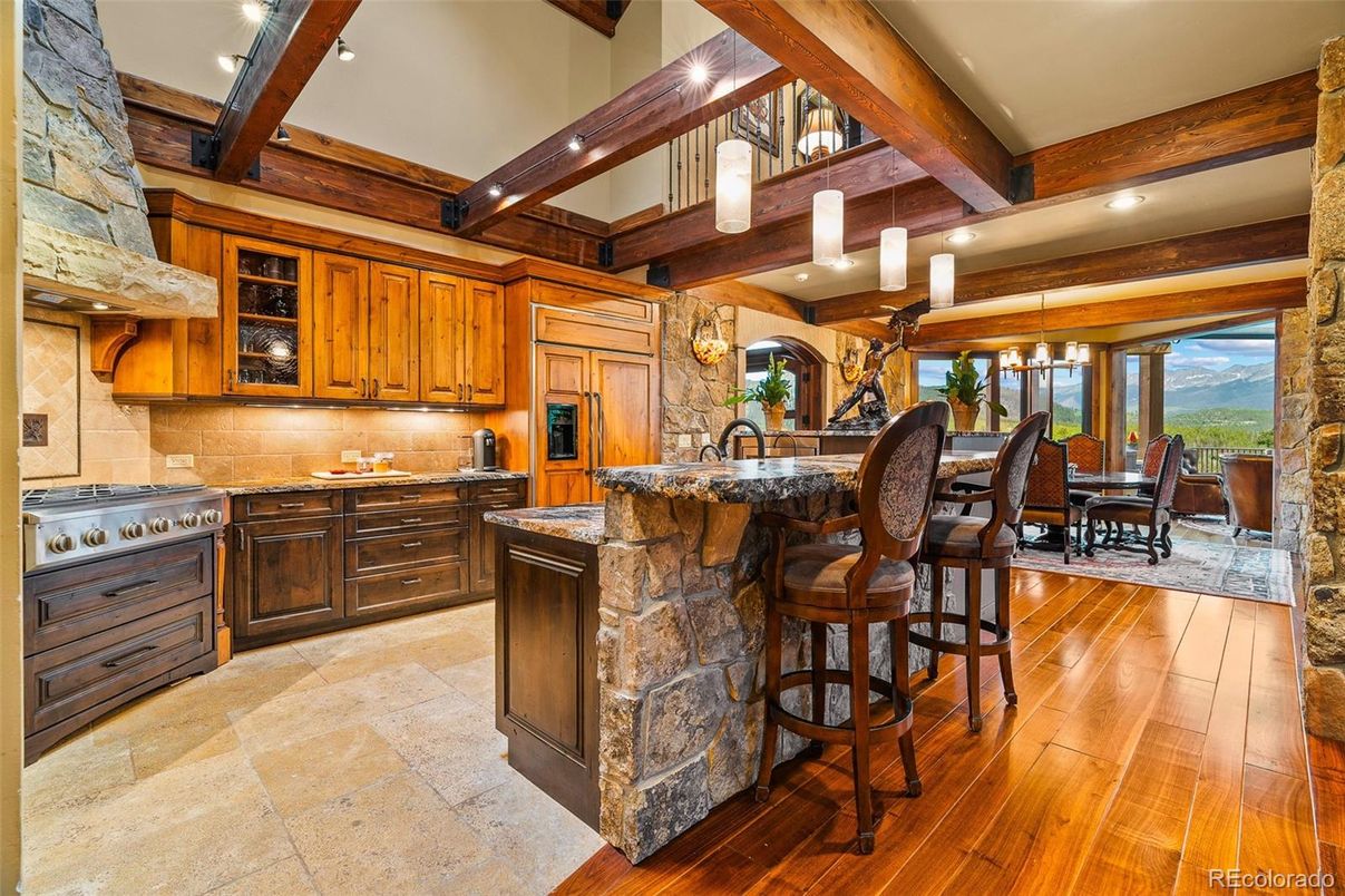 Chandelier, Dining room, Interior, Kitchen, Pendant Lights, Recessed Lighting, Stainless Steel Appliances, Wooden Beams, Wood Texture Flooring