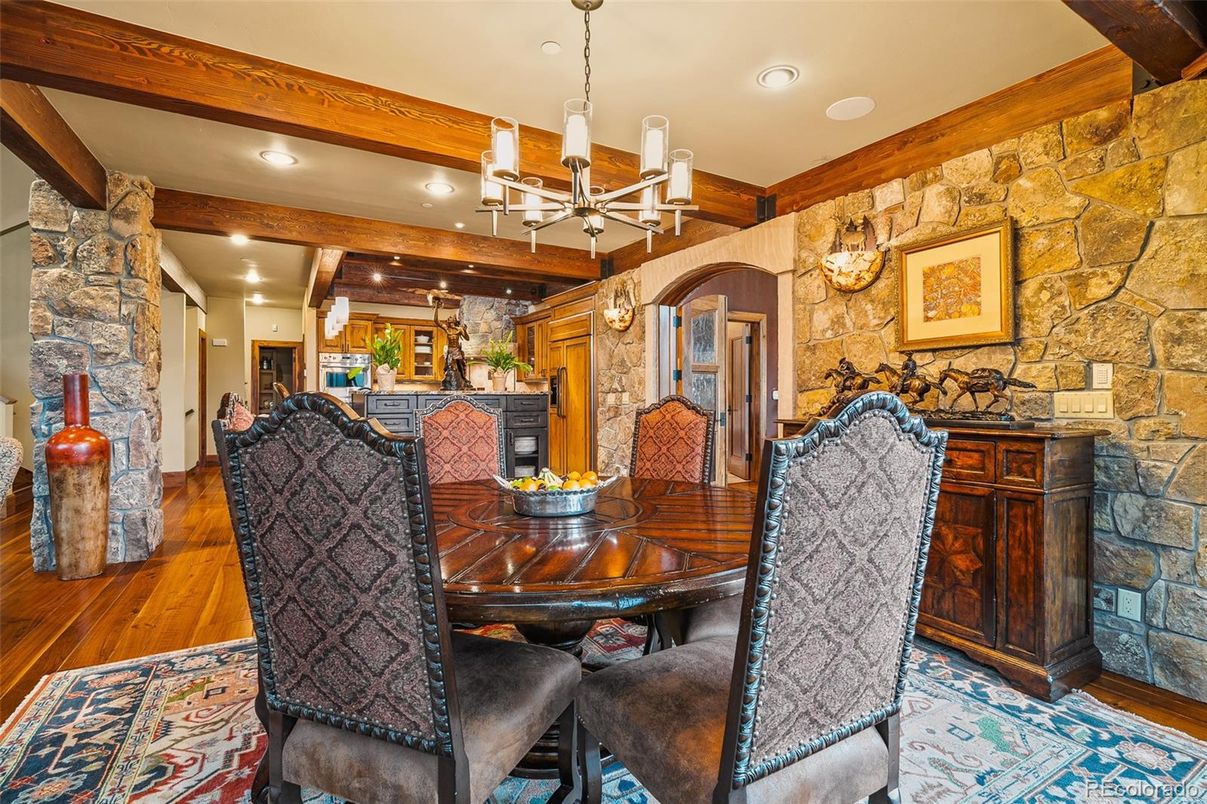 Chandelier, Dining room, Interior, Pendant Lights, Recessed Lighting, Stone Walls, Wooden Beams, Wood Texture Flooring