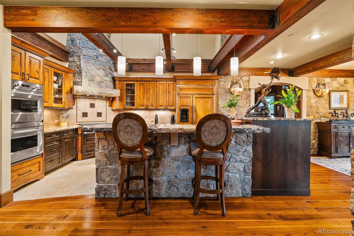 Interior, Kitchen, Pendant Lights, Recessed Lighting, Stainless Steel Appliances, Stone Walls, Wooden Beams, Wood Texture Flooring