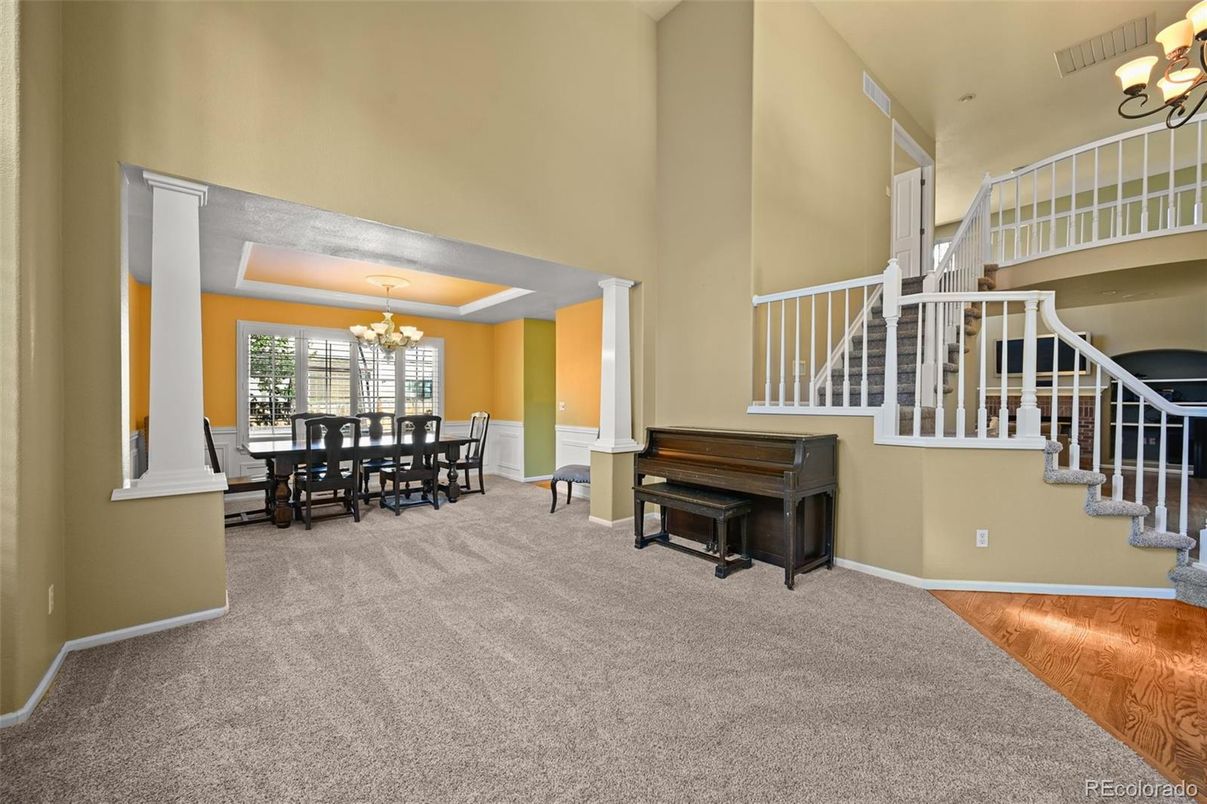 Chandelier, Dining room, Interior, Piano, Wood Texture Flooring
