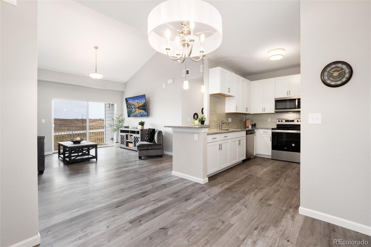 Chandelier, Interior, Kitchen, Pendant Lights, Stainless Steel Appliances, Wood Texture Flooring