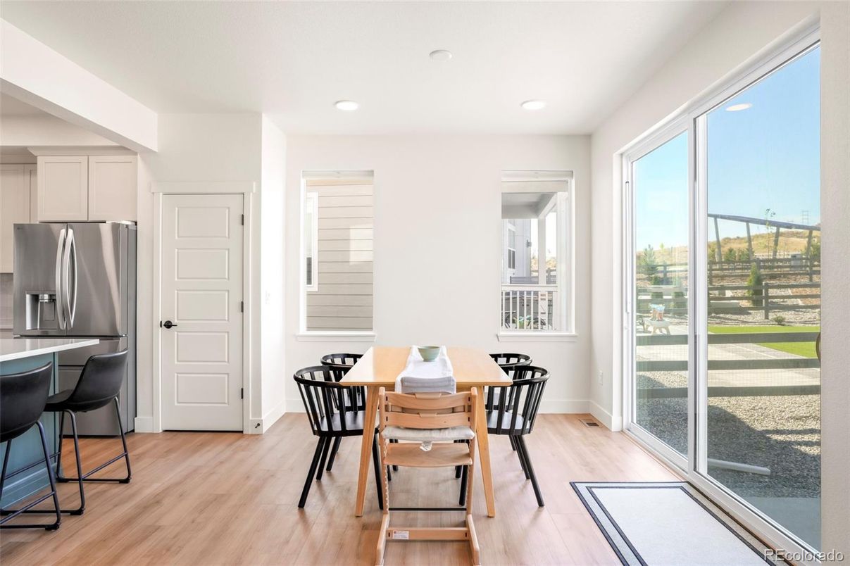Dining room, Interior, Kitchen, Recessed Lighting, Stainless Steel Appliances, Wood Texture Flooring