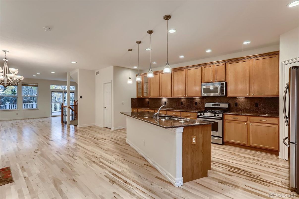 Chandelier, Interior, Kitchen, Pendant Lights, Recessed Lighting, Stainless Steel Appliances, Wood Texture Flooring