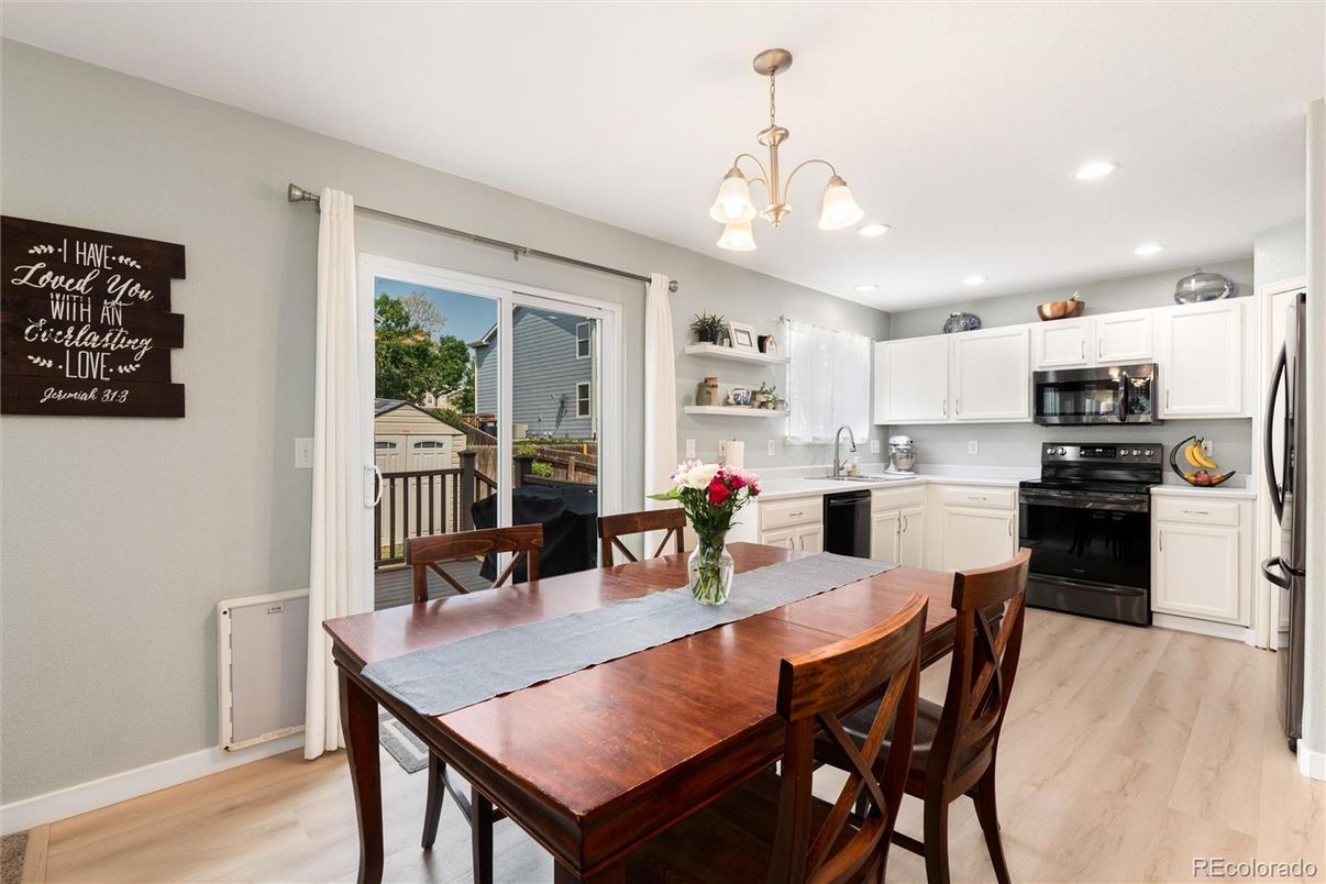 Dining room, Interior, Kitchen, Pendant Lights, Recessed Lighting, Stainless Steel Appliances, Wood Texture Flooring