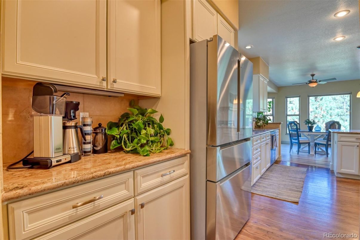 Dining room, Interior, Kitchen, Recessed Lighting, Stainless Steel Appliances, Wood Texture Flooring