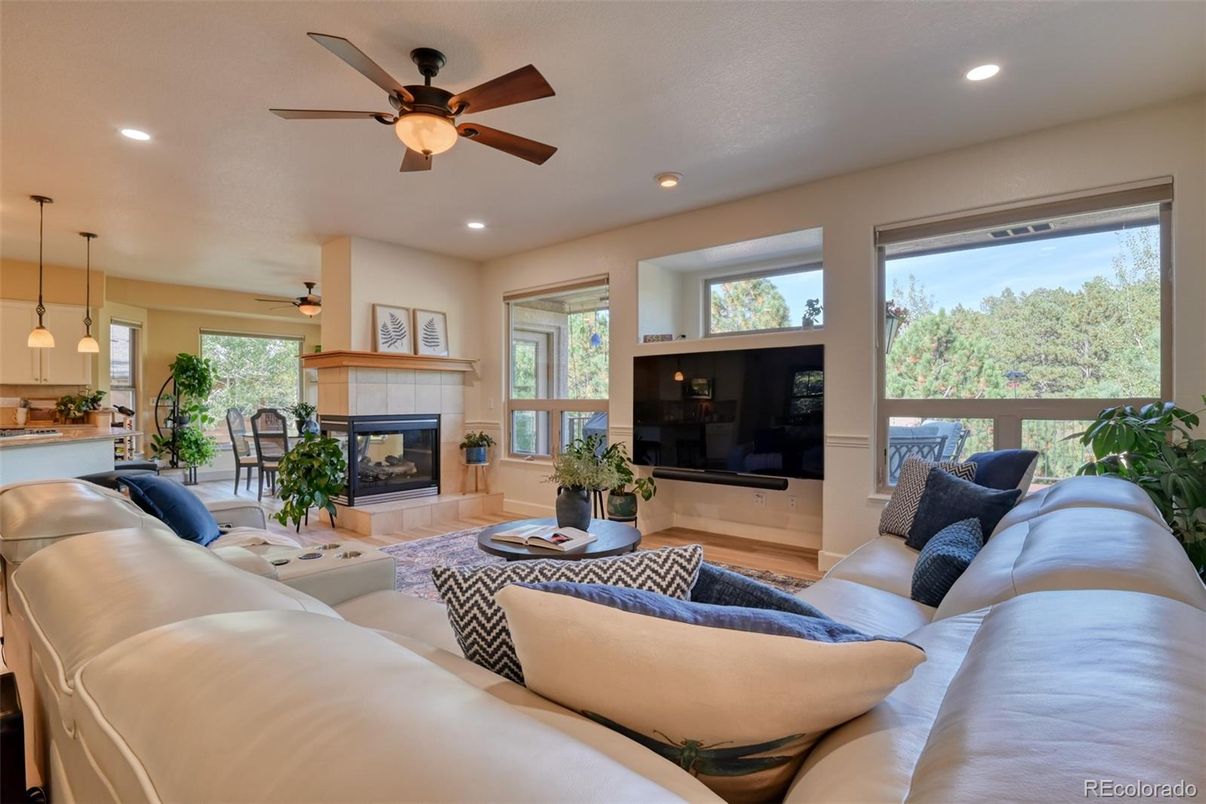 Dining room, Fireplace, Interior, Living room, Pendant Lights, Recessed Lighting, Wood Texture Flooring