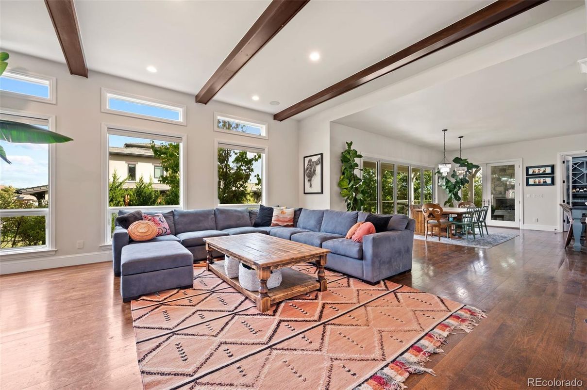 Chandelier, Dining room, Interior, Living room, Pendant Lights, Recessed Lighting, Wooden Beams, Wood Texture Flooring
