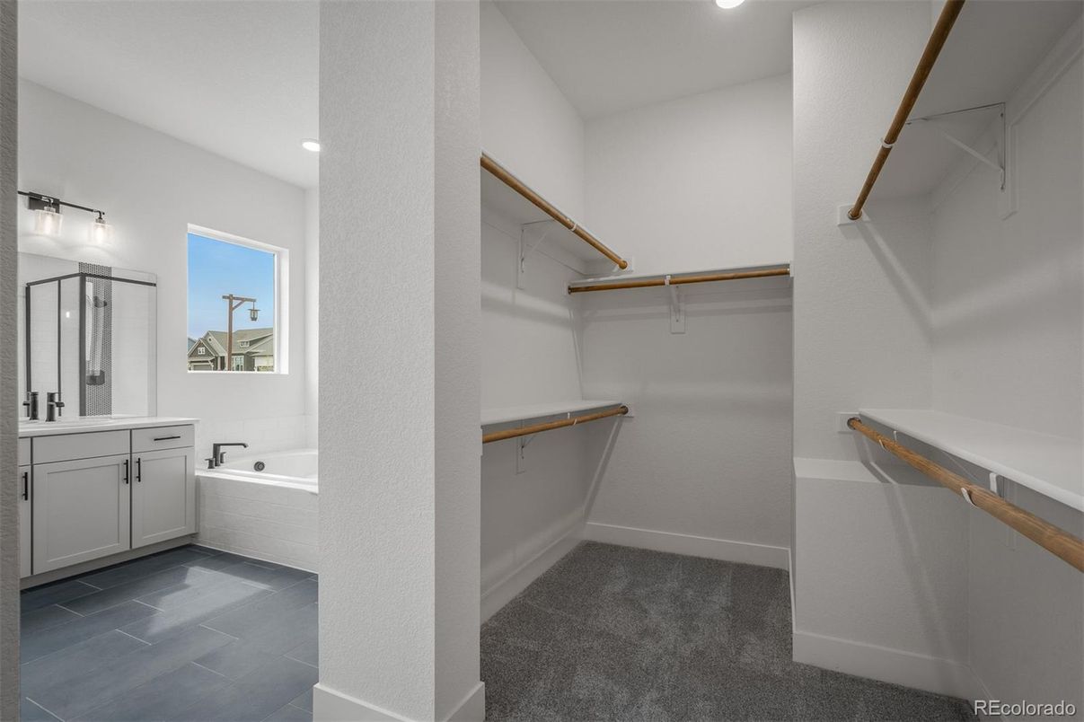 Bathroom, Dual Sink Vanities, Interior, Recessed Lighting, Walk-in Closets