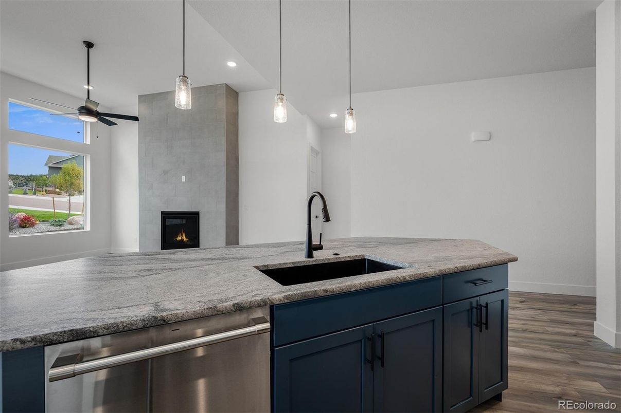 Fireplace, Interior, Kitchen, Pendant Lights, Recessed Lighting, Stainless Steel Appliances, Wood Texture Flooring