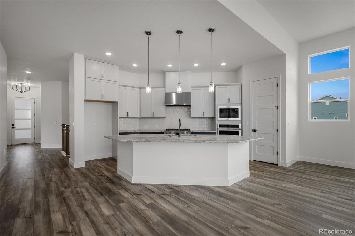 Interior, Kitchen, Pendant Lights, Recessed Lighting, Stainless Steel Appliances, Wood Texture Flooring